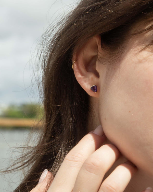 Contemporary Trilliant Amethyst Studs 9 Carat Yellow Gold
