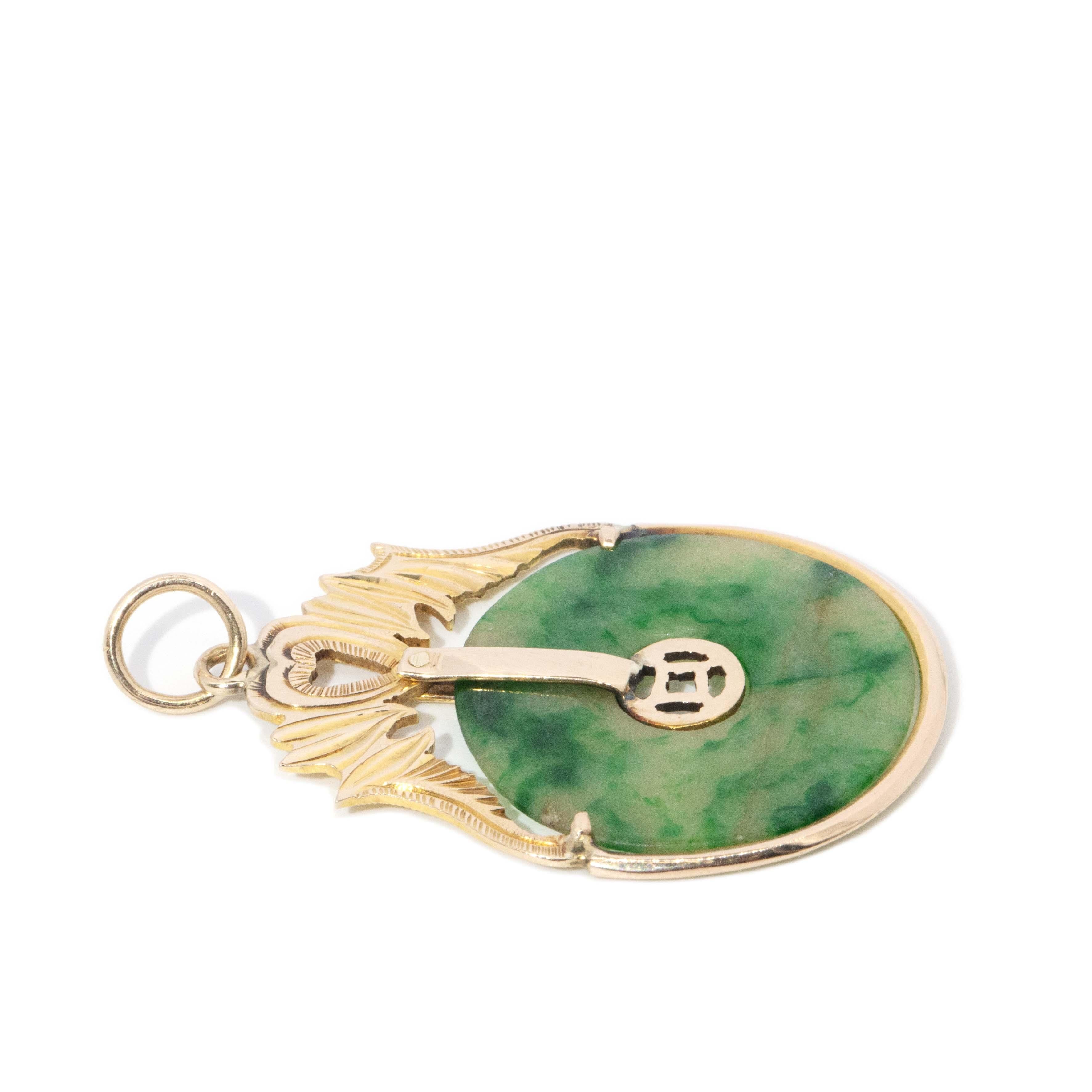 Vintage Circa 1970s Jade Disc Pendant 14 Carat Yellow Gold