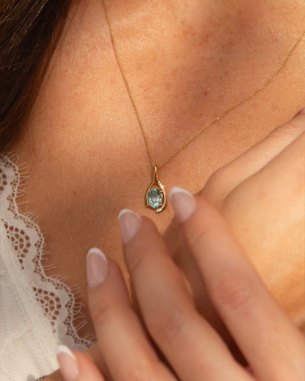 Franca 1980s Blue Zircon Open Pattern Pendant 9ct gold Pendants/Necklaces Imperial Jewellery 