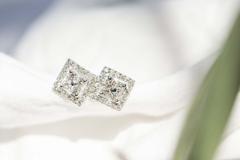 Contemporary Half Carat Diamond Studs 14 Carat White Gold