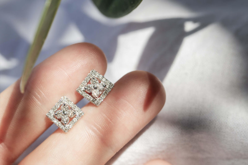 Contemporary Half Carat Diamond Studs 14 Carat White Gold