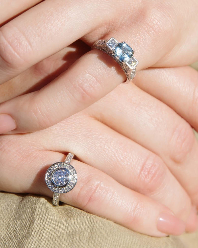 Contemporary Rubover Brilliant Diamond Halo Ring in Platinum