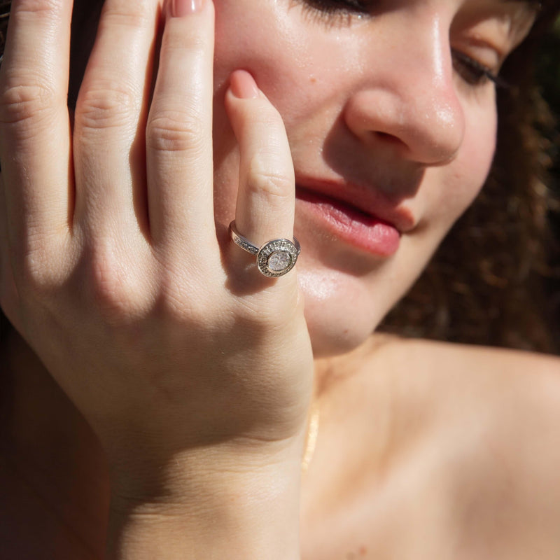 Contemporary Rubover Brilliant Diamond Halo Ring in Platinum