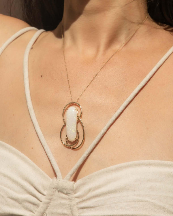 Vintage Circa 1980s Elongated White Opal Pendant 18 Carat Gold