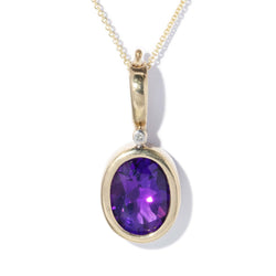 Vintage Circa 1980s Oval Amethyst Enhancer Pendant 9 Carat Gold