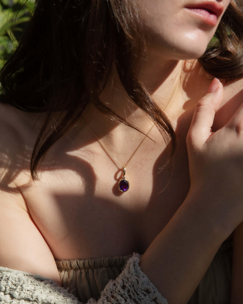 Vintage Circa 1980s Oval Amethyst Enhancer Pendant 9 Carat Gold