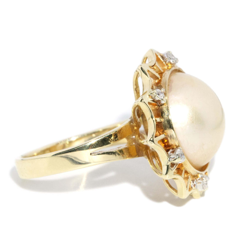 Vintage Circa 1950s Pearl and Diamond Halo Ring 14 Carat Gold