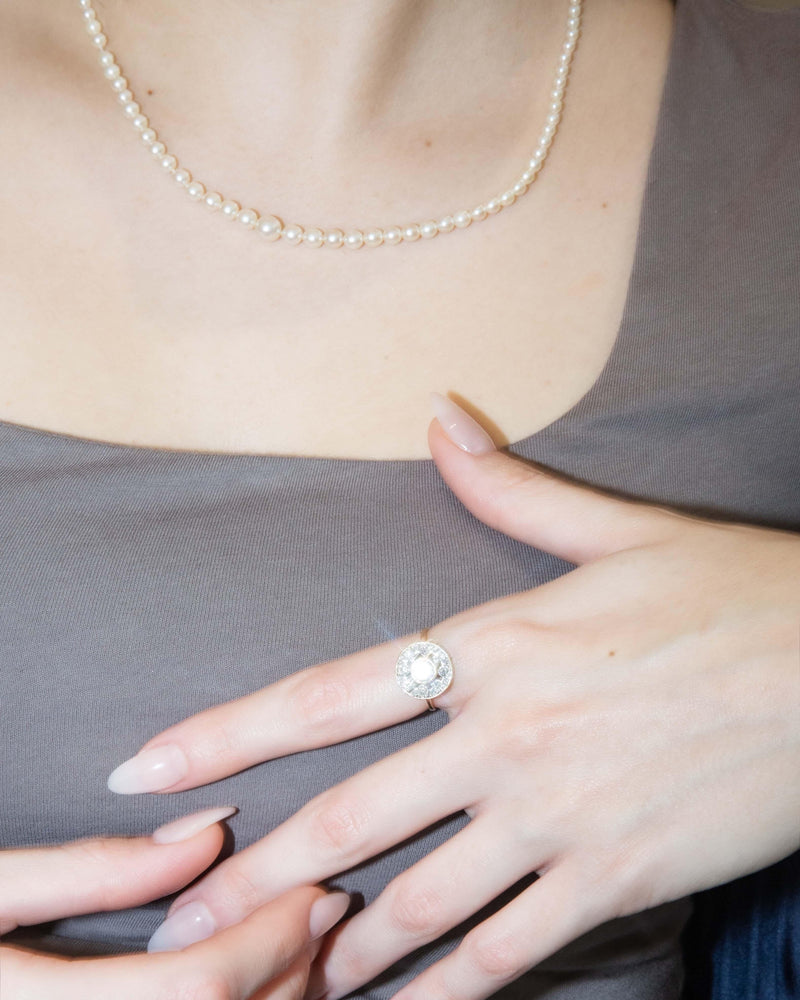 Vintage Circa 1980s Diamond Disc Halo Ring 18 Carat Gold