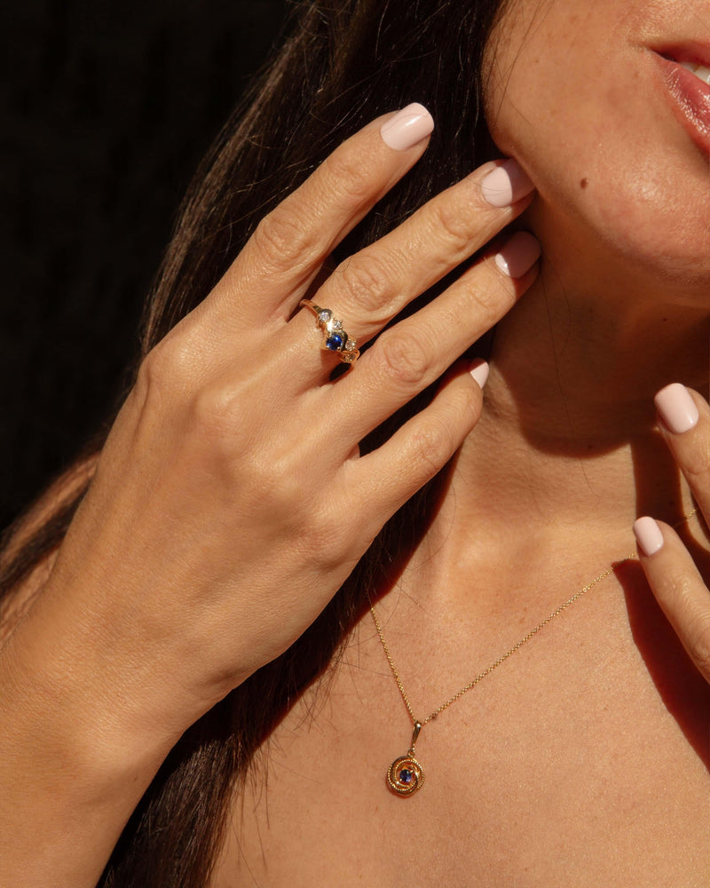 Contemporary Sapphire & Diamond Ripple Ring 9 Carat Yellow Gold