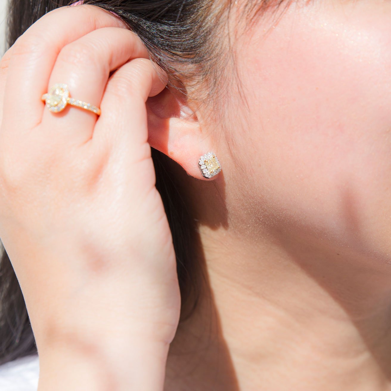 18 Carat White Gold Certified Fancy Yellow Diamond Halo Stud