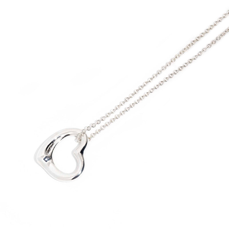 Elsa Peretti® Open Heart pendant in platinum with diamonds, 11 mm wide. |  Tiffany & Co.